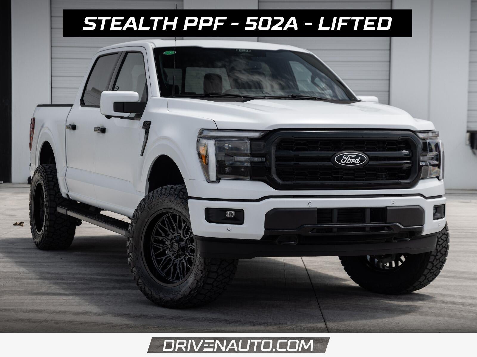2025 Ford F-150 LARIAT in Oxford White — front three-quarter view