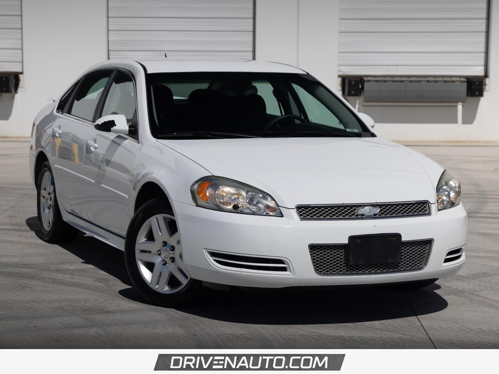 2013 Chevrolet Impala LT in Summit White — front three-quarter view