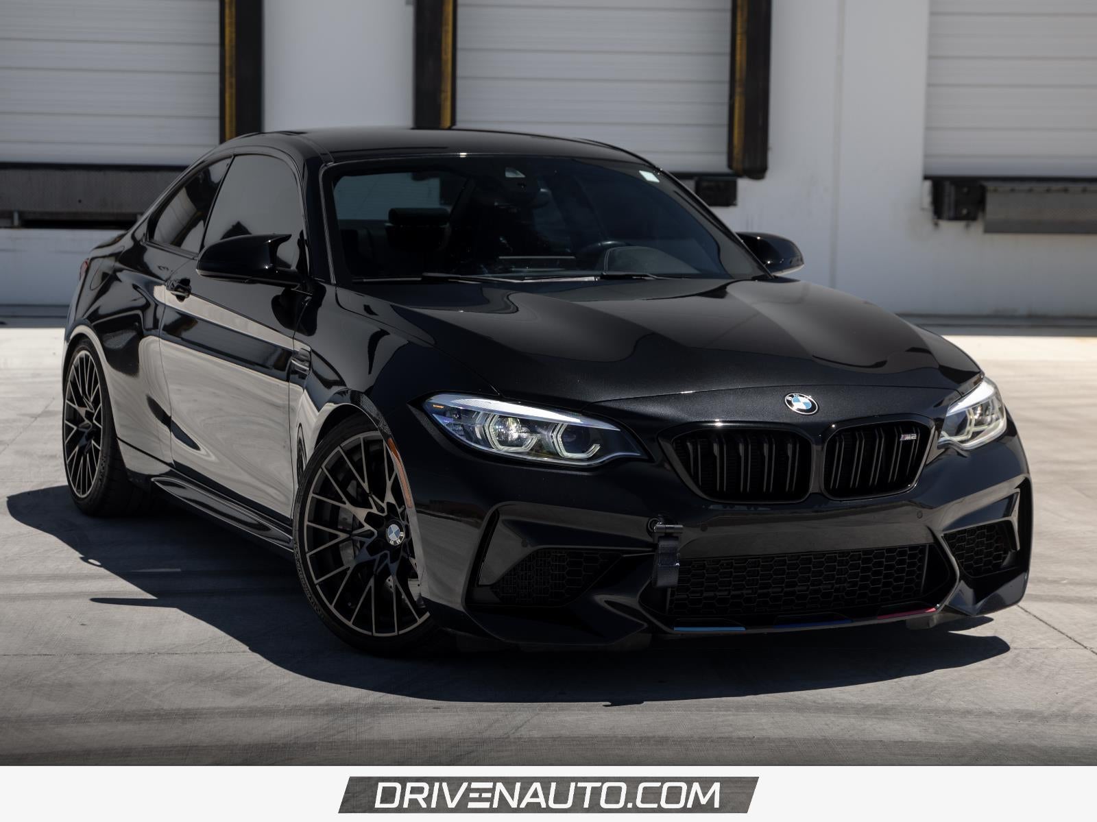 2019 BMW M2 Competition in Black Sapphire Metallic — front three-quarter view